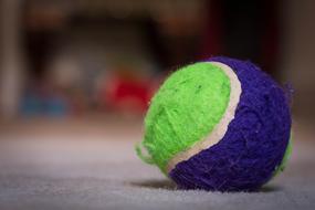 purple green tennis ball