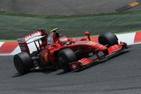 Colorful "Ferrari" racing car driving on the road, on the Formula