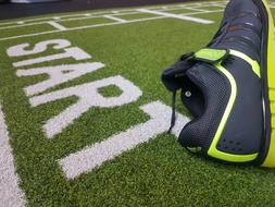 sneaker on the grass at the start
