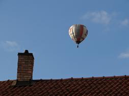 Balloon Flight and house roof