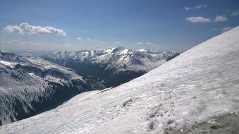 white snow on the side of a glacier