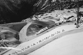 Black and white photo of of the beautiful, snowy ski slope in France, in the winter