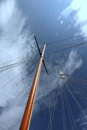mast of a large sailboat against the sky
