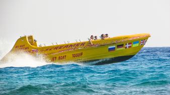 happy people in Speed Boat on Water