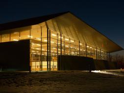 glass building of sports club at night