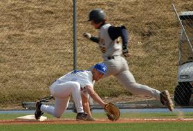 Baseball players playing on the colorful field, on the competition