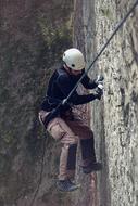 climber on a rock close up