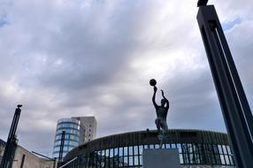 Sculpture on Street and Basketball arena