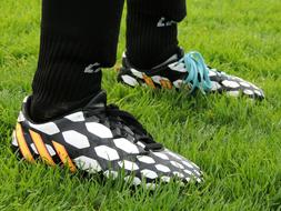 Cleats shoes on Grass