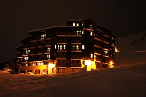 hotel with lights in the windows at night