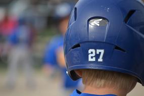 helmet with a number on the head close-up on a blurred background