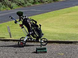 Golf Bag On The Green Field