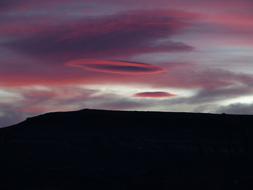 Beautiful landscape with silhouette of the mountain, at beautiful and colorful sunrise with clouds