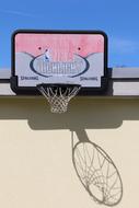 basketball hoop on the building facade