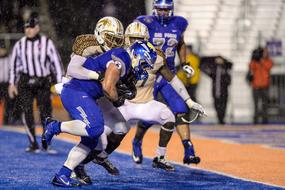 Football American Game in the rain