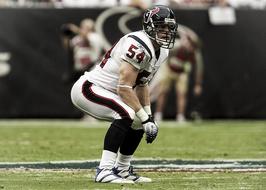 Professional Player in american football on a blurred background