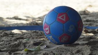 Soccer ball on Beach at Summer