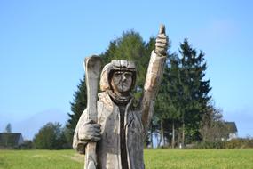 Skier Skiing woodcarved statue