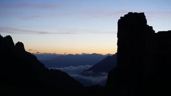 gray morning over the mountains of south tyrol