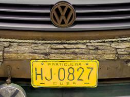 yellow numbers on an old Volkswagen car