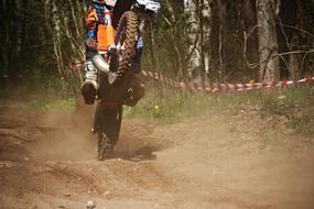 Motocross Enduro close-up in dust