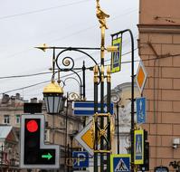 Colorful road signs on the beautiful street with the buildings