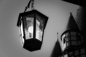 black and white closeup image of street lamp