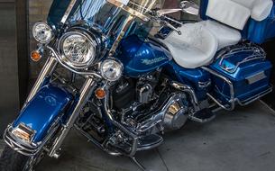 photo of shiny blue harley davidson