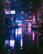 Beautiful city with colorful lights, in rain, at night, in Thailand