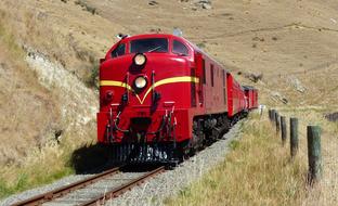 red Train Locomotive on a railway