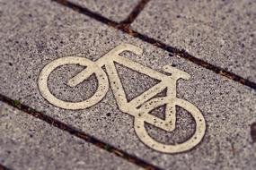 bicycle sign on paved road