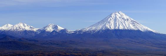 panorama of snowy mountains in Kamchatka, Russia