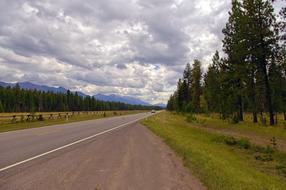 Beautiful landscape of the highway, among the colorful plants in Swan River Valley, USA