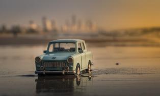model car stands on water on a blurred background