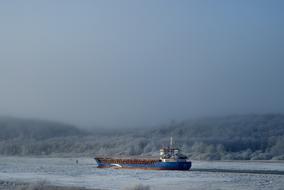 photo of a ship on the winter Gota river in Sweden