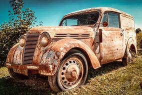 photo of old rusty Renault Juvaquatre car