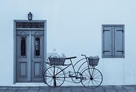 bicycle as decoration near the facade of a house in cyprus