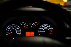 Colorful car dashboard with bright signs, inside