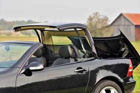 black convertible with retractable roof