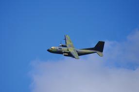 green Military Transport Aircraft at blue sky