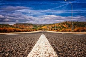 empty asphalt road with markings