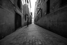 monochrome, street of the old town in Madrid, Spain