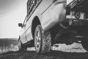 closeup monochrome photo of Off-Road 4X4 Car