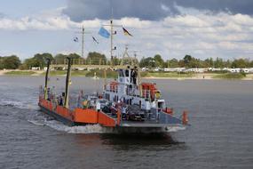 passenger Ferry on water at coastline