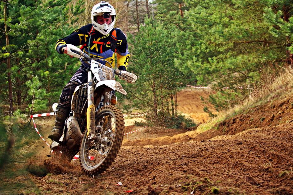 motorcyclist during a race on a sandy road