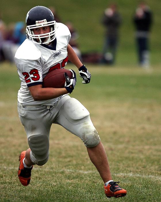 Running Back in football on a blurred background