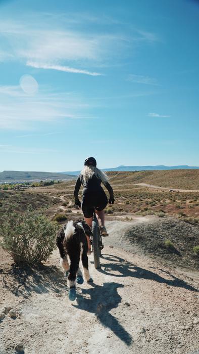 biker on Mountain at Blue Sky