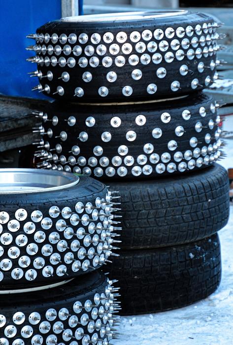 Shiny, metallic and black Ice Speedway winter tiers, on the snow