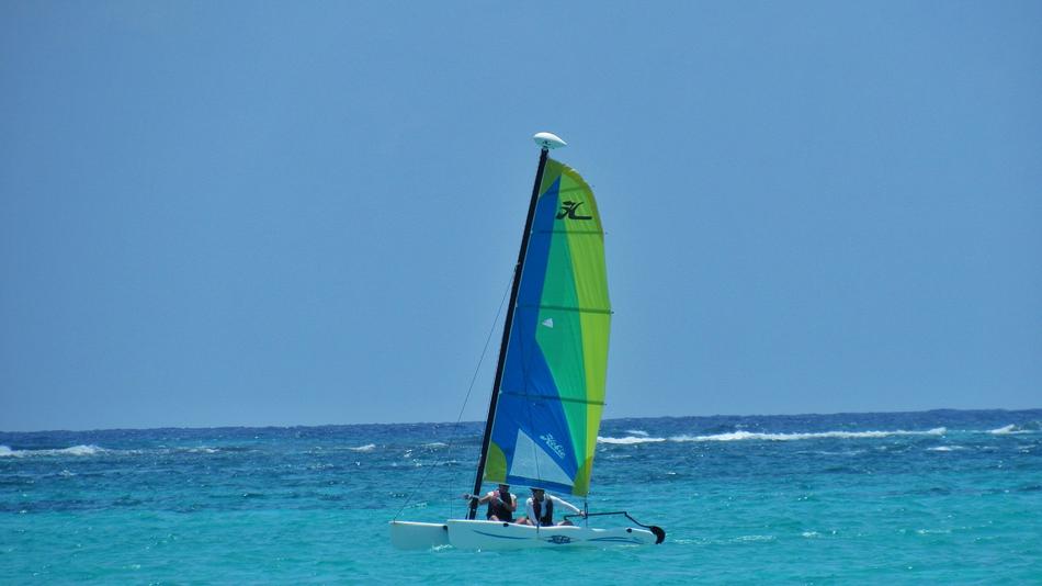 Sailboat in Ocean over Reef