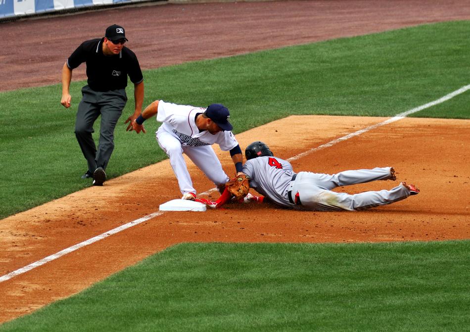 Baseball player Tagged Out base